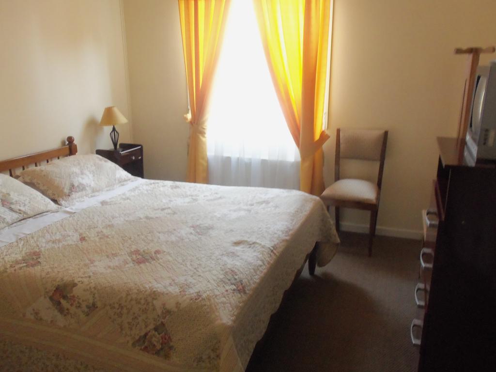 Hostal Joshiken Punta Arenas Rum bild